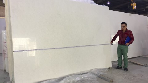 Selecting white marble blocks